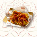 Crispy fried chicken coated in spicy Sichuan BBQ sauce with cumin, roasted chillies and fermented bean paste – bold Chinese street food at Wok Manifesto Newcastle.