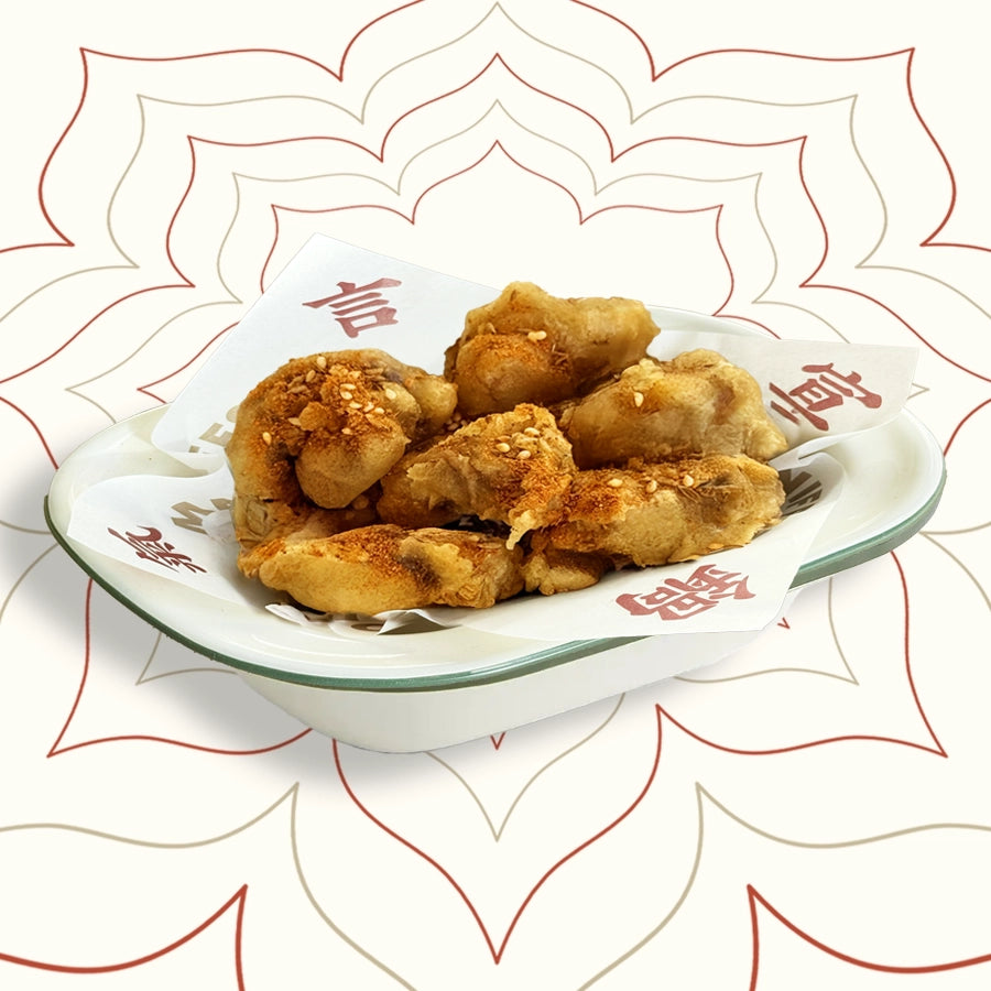 Crispy fried mushrooms tossed in barbecue-style dry spice mix – a bold, vegetarian Chinese street food snack from Wok Manifesto Newcastle.