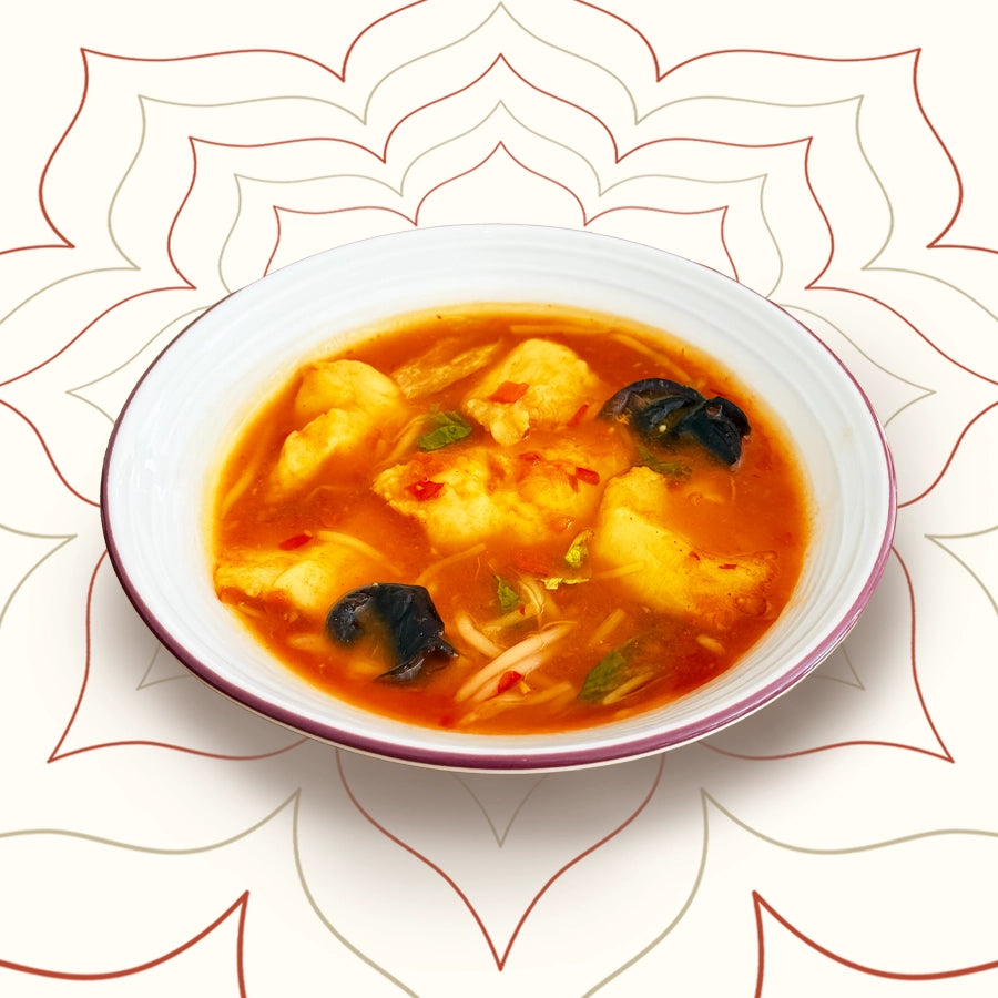 Guizhou-style hot and sour fish simmered in house-aged tomato broth with beansprouts and lettuce – a light, tangy and authentic Chinese dish from Wok Manifesto Newcastle.