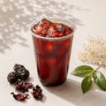 Traditional Smoked Plum Iced Tea (Suan Mei Tang) made with smoked plums, hawthorn, orange peel and herbs – a refreshing Chinese summer drink served at Wok Manifesto Newcastle.