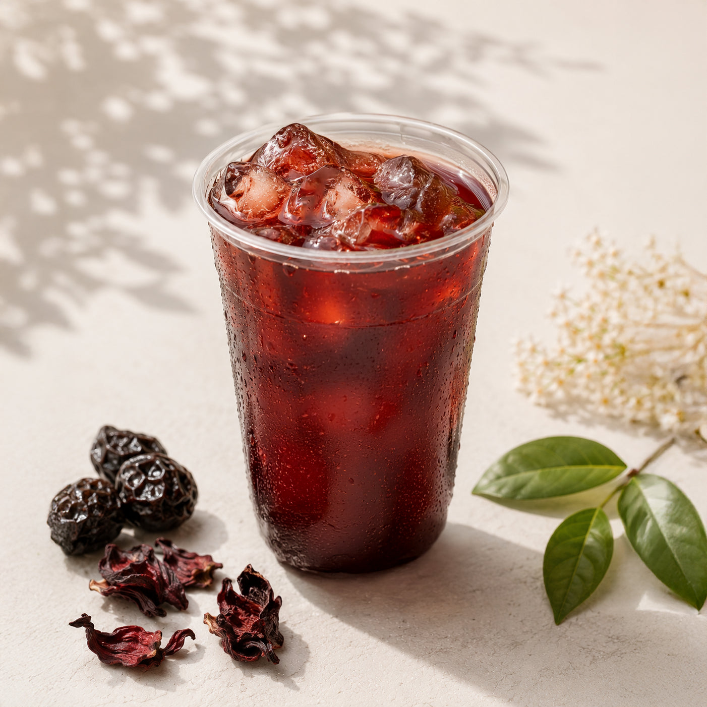 Traditional Smoked Plum Iced Tea (Suan Mei Tang) made with smoked plums, hawthorn, orange peel and herbs – a refreshing Chinese summer drink served at Wok Manifesto Newcastle.