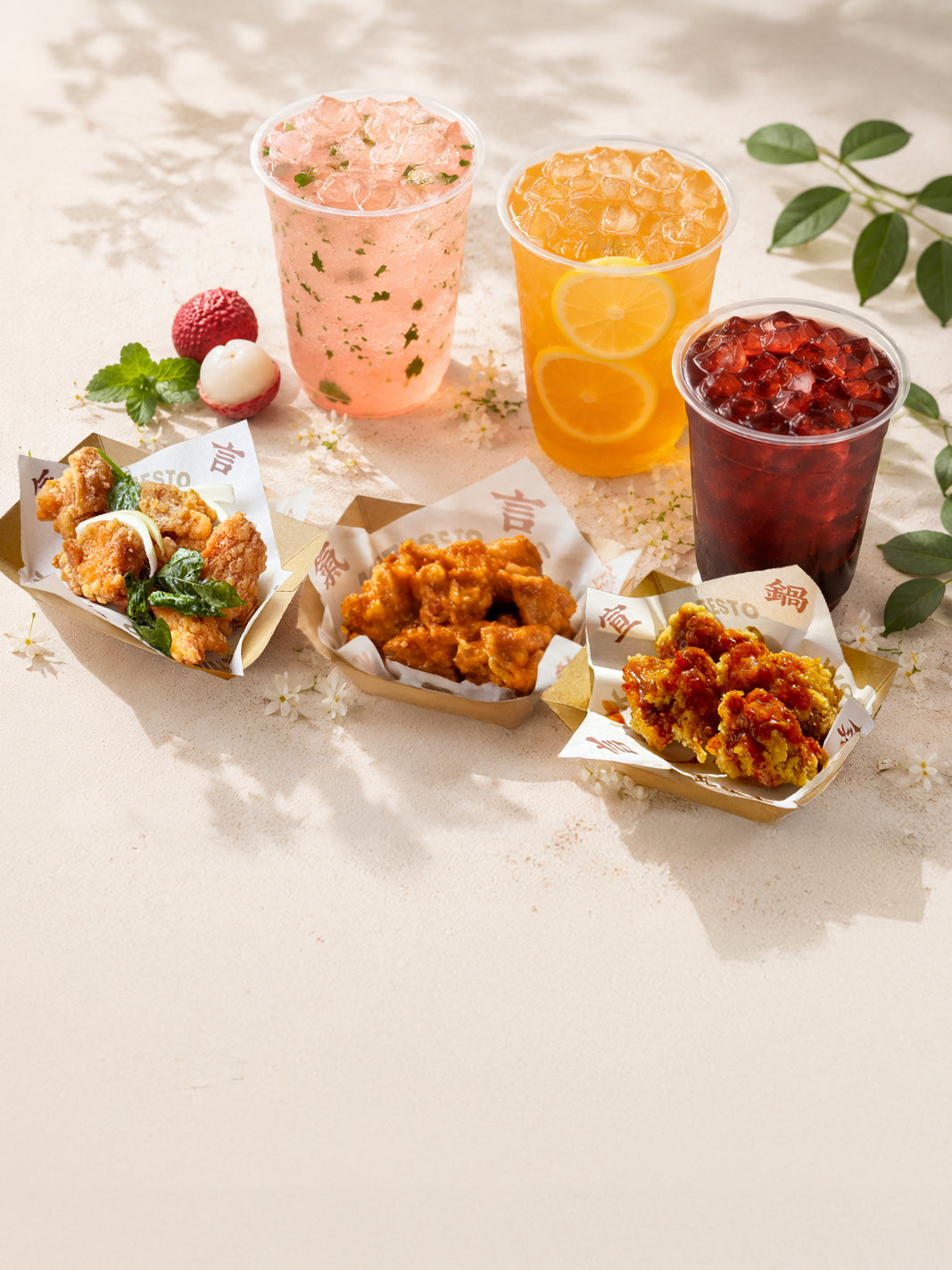 Summer drinks and authentic Asian street food at Wok Manifesto Newcastle, featuring Hong Kong Salted Lemon Tea, Suan Mei Tang, Lychee Elderflower Soda, Taiwanese Crispy Chicken, General Tso’s Chicken and Crispy Chicken with Sichuan BBQ Sauce.