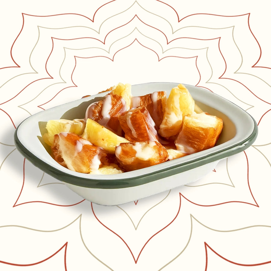 Crispy Chinese youtiao stuffed with minced prawns, drizzled with fruity sauce and pineapple – a playful street food dish from Wok Manifesto Newcastle.